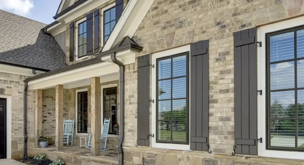Balanced‑fixed casement window replacement on a Canadian home elevation